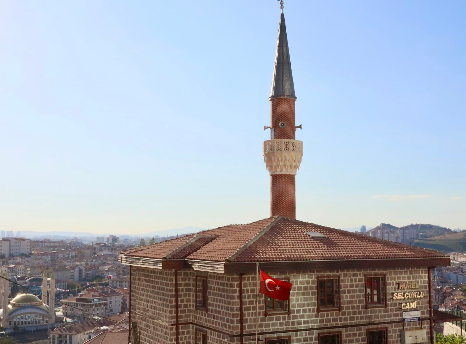 Ankara rooftops, with a mosque and minaret above the city